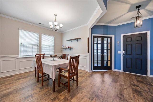 707 Redbud Ln, Summerville, SC 29486 - dining room with french doors, visible vents, a notable chandelier, and wood finished floors
