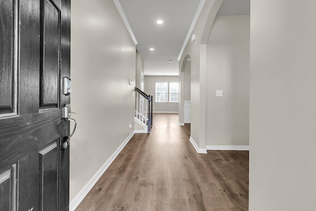 5138 Preserve Blvd, Ladson, SC 29456 - entryway with arched walkways, baseboards, wood finished floors, ornamental molding, and stairs