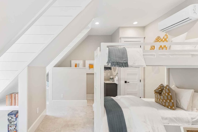 bedroom featuring carpet, recessed lighting, and a wall mounted AC