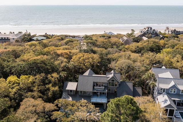 bird's eye view featuring a view of the beach and a water view