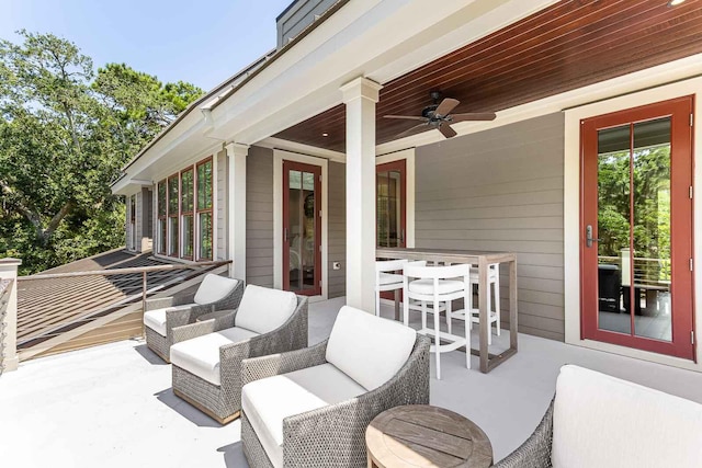 view of patio featuring a ceiling fan