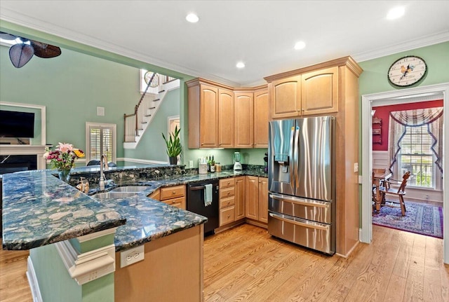 kitchen with stainless steel refrigerator with ice dispenser, black dishwasher, a sink, ornamental molding, and light wood-type flooring