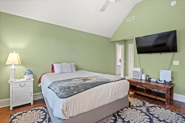 bedroom with wood finished floors, baseboards, a ceiling fan, and high vaulted ceiling