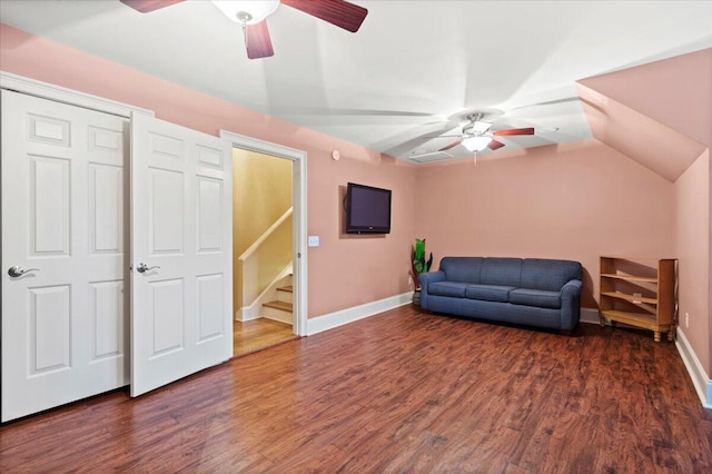 sitting room featuring ceiling fan, wood finished floors, baseboards, and lofted ceiling