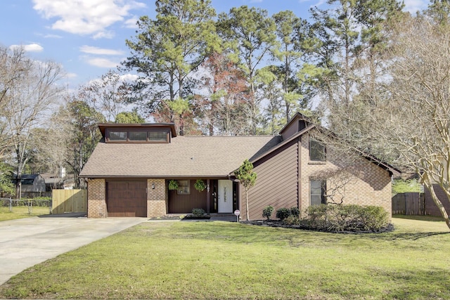 mid-century modern home featuring brick siding, concrete driveway, a front lawn, and fence