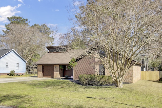 mid-century inspired home featuring a front lawn, a garage, fence, and brick siding