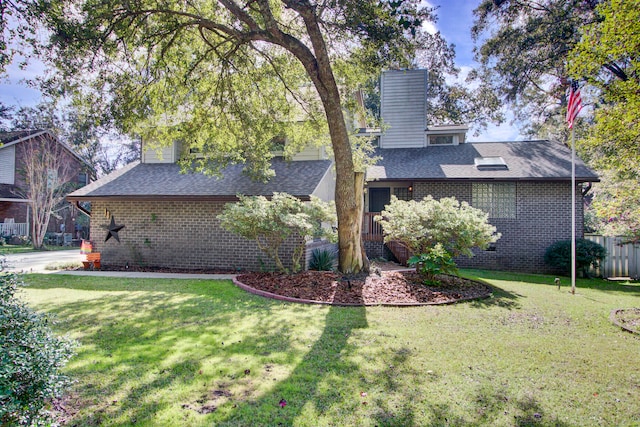 view of home's exterior with a yard