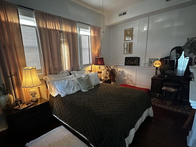 bedroom featuring wood-type flooring