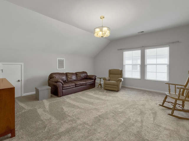 carpeted living room featuring lofted ceiling