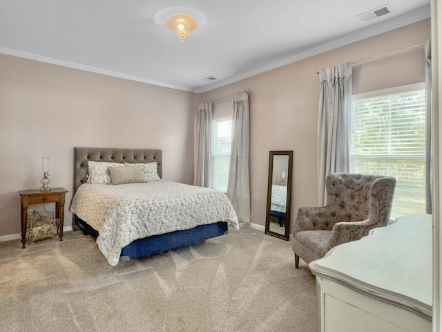 carpeted bedroom with crown molding