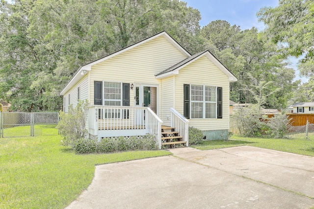 view of front of home with a front yard