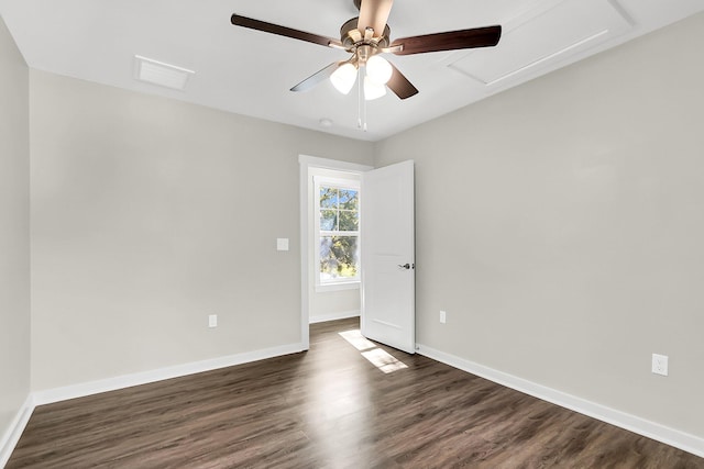 2711 Henry St, North Charleston, SC 29405 - empty room featuring ceiling fan, dark wood-style flooring, and baseboards