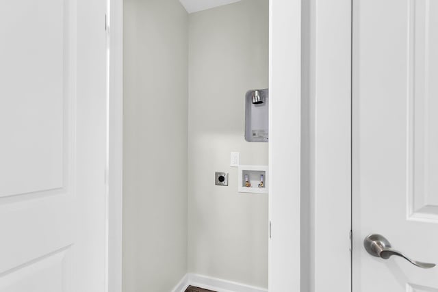 clothes washing area featuring washer hookup and electric dryer hookup