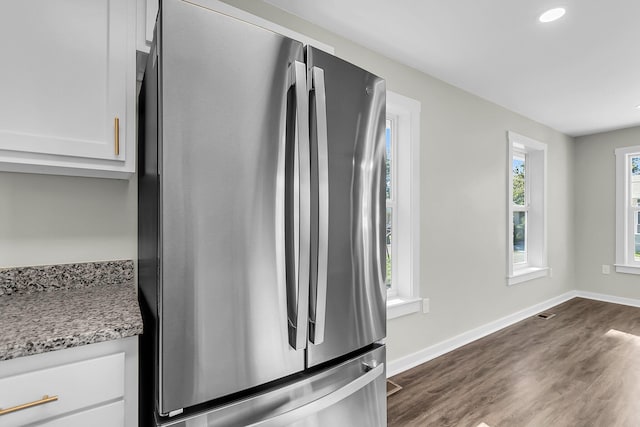 2711 Henry St, North Charleston, SC 29405 - kitchen featuring freestanding refrigerator, white cabinetry, dark wood finished floors, baseboards, and recessed lighting