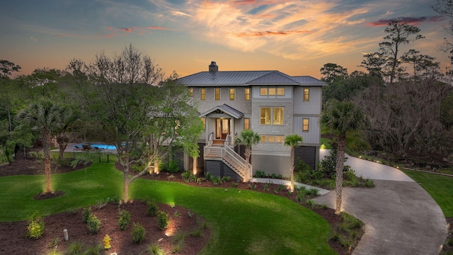 view of front of property with a yard