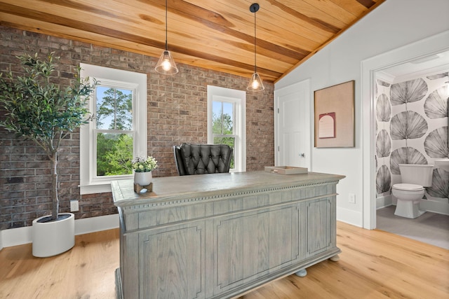 office space featuring brick wall, vaulted ceiling, light hardwood / wood-style flooring, and wood ceiling