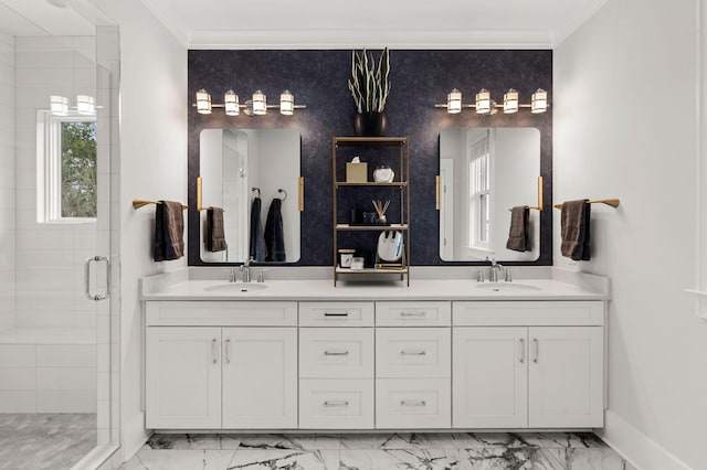 bathroom featuring crown molding, a shower with shower door, and vanity