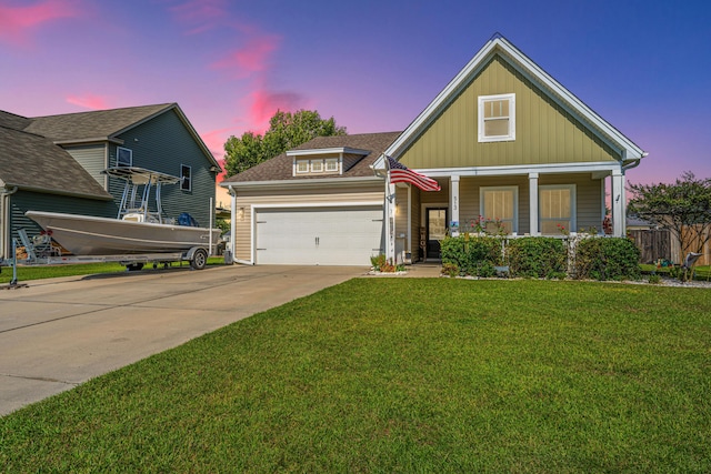 513 Abigail St, Moncks Corner, SC 29461 - view of front of property with fence, covered porch, a garage, concrete driveway, and a front yard