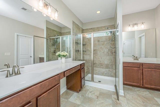 513 Abigail St, Moncks Corner, SC 29461 - full bathroom featuring a sink, two vanities, a shower stall, and visible vents