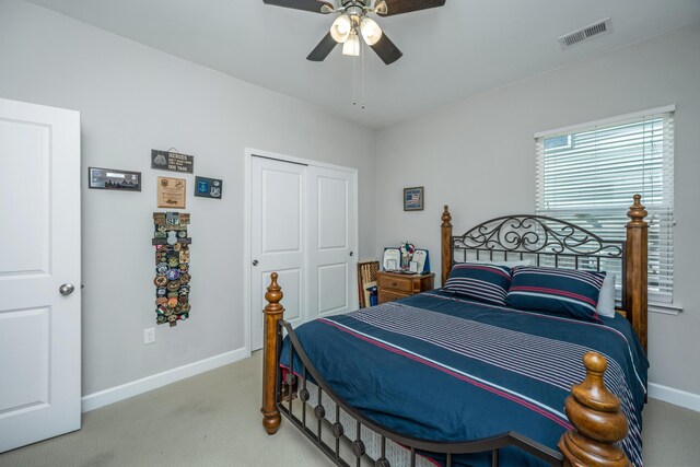 513 Abigail St, Moncks Corner, SC 29461 - bedroom featuring a ceiling fan, a closet, visible vents, baseboards, and light colored carpet