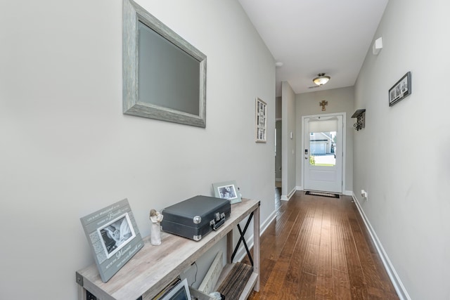 entryway with dark hardwood / wood-style floors