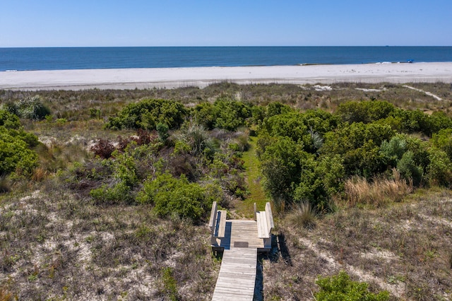 drone / aerial view with a view of the beach and a water view