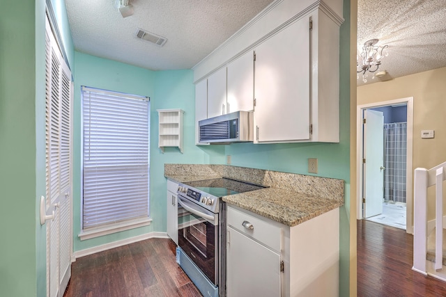1115 Shadow Lake Cir, Mount Pleasant, SC 29464 - kitchen featuring stainless steel appliances, a textured ceiling, dark wood-style flooring, white cabinets, and a chandelier