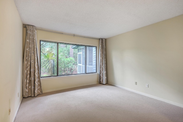 1115 Shadow Lake Cir, Mount Pleasant, SC 29464 - unfurnished room featuring carpet, a textured ceiling, and baseboards