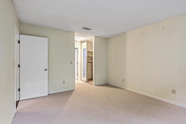1115 Shadow Lake Cir, Mount Pleasant, SC 29464 - unfurnished bedroom with carpet floors, baseboards, a textured ceiling, and a closet