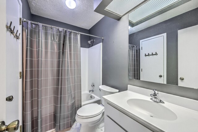 1115 Shadow Lake Cir, Mount Pleasant, SC 29464 - full bathroom with a textured ceiling, toilet, vanity, and shower / bath combination with curtain