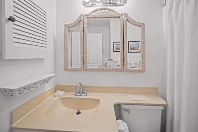 bathroom with vanity and toilet
