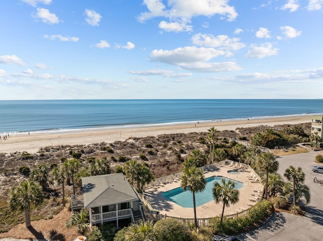 bird's eye view with a beach view and a water view