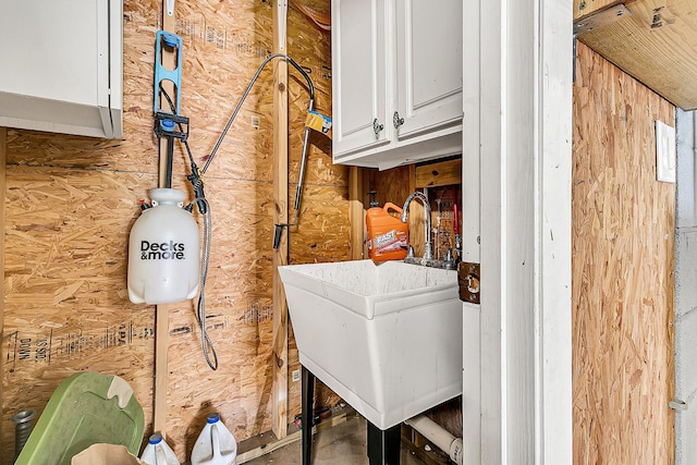 washroom with cabinet space
