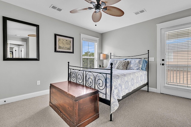 carpeted bedroom with baseboards, access to exterior, and ceiling fan