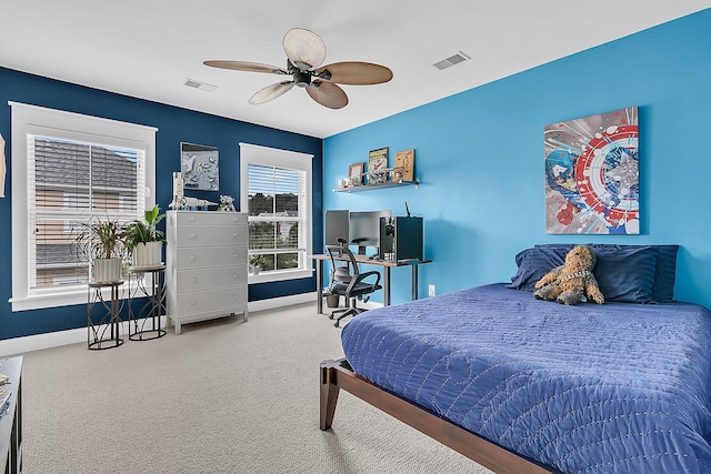 bedroom featuring baseboards, carpet, and ceiling fan