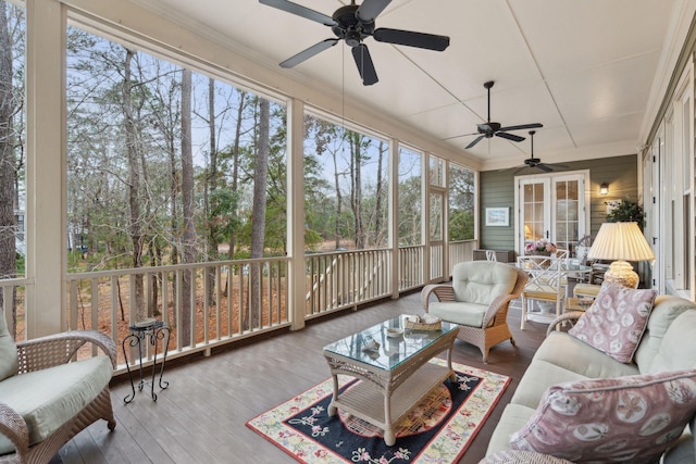 sunroom / solarium featuring a healthy amount of sunlight