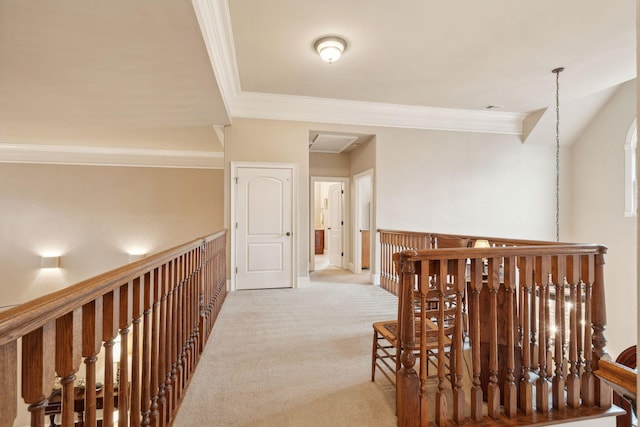 hallway featuring ornamental molding, light carpet, and an upstairs landing