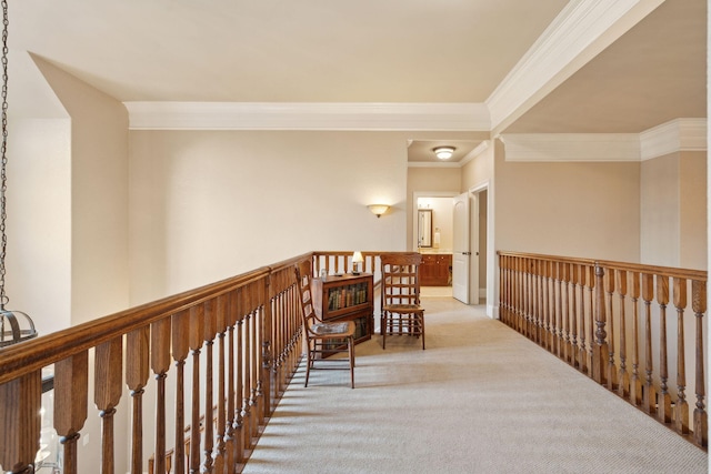 hallway featuring crown molding and light colored carpet