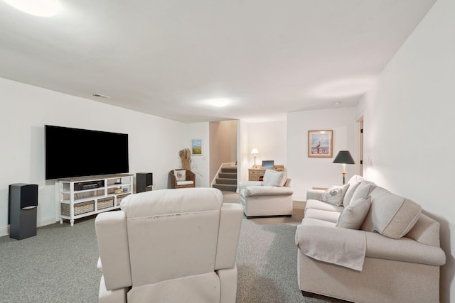 carpeted living room with stairway