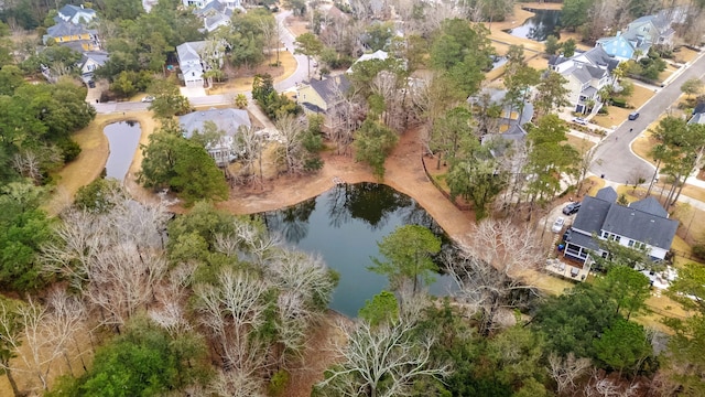 birds eye view of property featuring a residential view and a water view