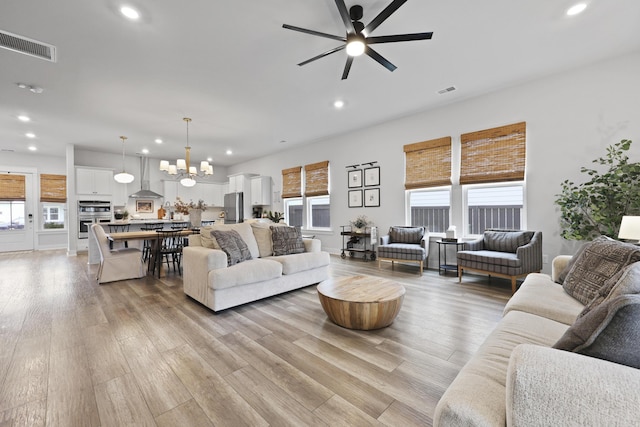 109 Medford St, Summerville, SC 29486 - living area featuring recessed lighting, ceiling fan, a chandelier, and light wood-type flooring