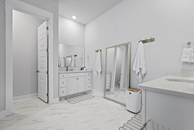 109 Medford St, Summerville, SC 29486 - full bathroom with marble finish floors, vanity, toilet, baseboards, and recessed lighting