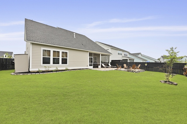 109 Medford St, Summerville, SC 29486 - back of house with a sunroom, a patio, a fire pit, and a shingled roof