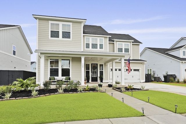 109 Medford St, Summerville, SC 29486 - view of front of property featuring covered porch, driveway, a front yard, and a garage
