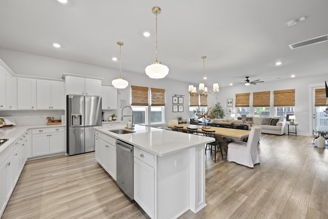 109 Medford St, Summerville, SC 29486 - kitchen with stainless steel appliances, a sink, recessed lighting, open floor plan, and light countertops