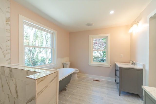 708 S Laurel St, Summerville, SC 29483 - full bath with a freestanding bath, plenty of natural light, and vanity