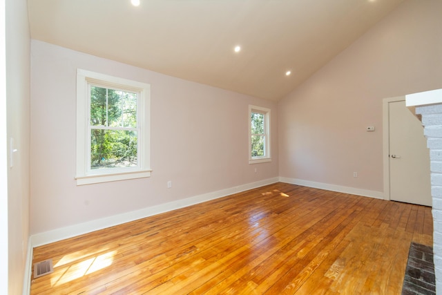 708 S Laurel St, Summerville, SC 29483 - unfurnished room featuring visible vents, a wealth of natural light, light wood-style floors, and lofted ceiling