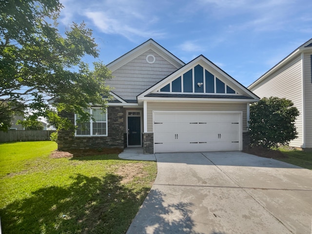 2910 John Cabot Dr, North Charleston, SC 29420 - craftsman-style house featuring concrete driveway, stone siding, and a garage