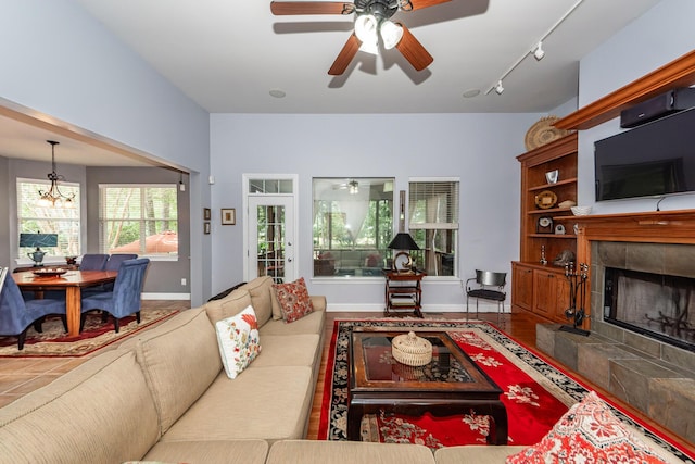 477 Commonwealth Rd, Mount Pleasant, SC 29466 - living room with a fireplace, ceiling fan, and track lighting