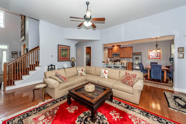 477 Commonwealth Rd, Mount Pleasant, SC 29466 - living room featuring wood finished floors, a ceiling fan, plenty of natural light, and stairway